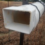 Pollen Substitute Dispenser on fence - View of opening